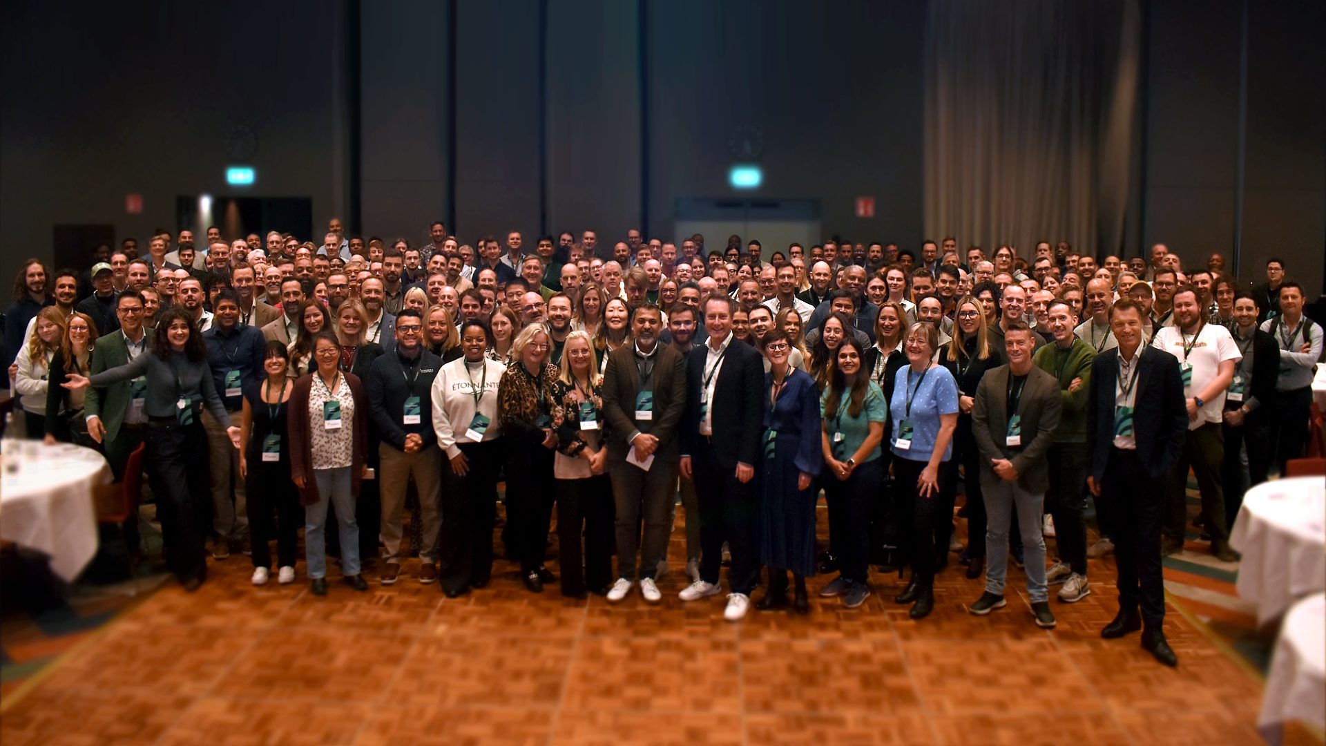 Icomera employees pose for a group photo at the company's 25th anniversary employee conference